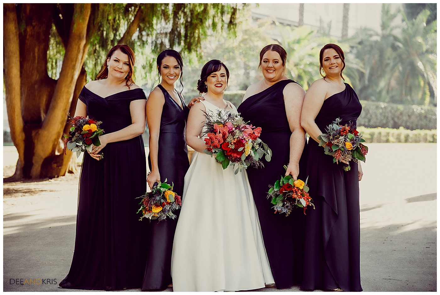 Bridal party pictures in the Capital Gardens in Downtown Sacramento, classic black bridesmaid gowns