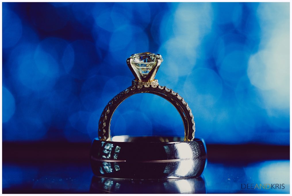 blue photography lighting for wedding rings