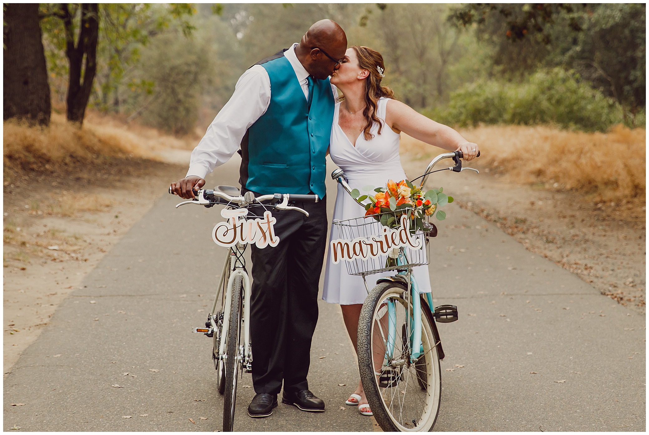 Bride and Groom with Bikes on American River Trail in Sacramento
