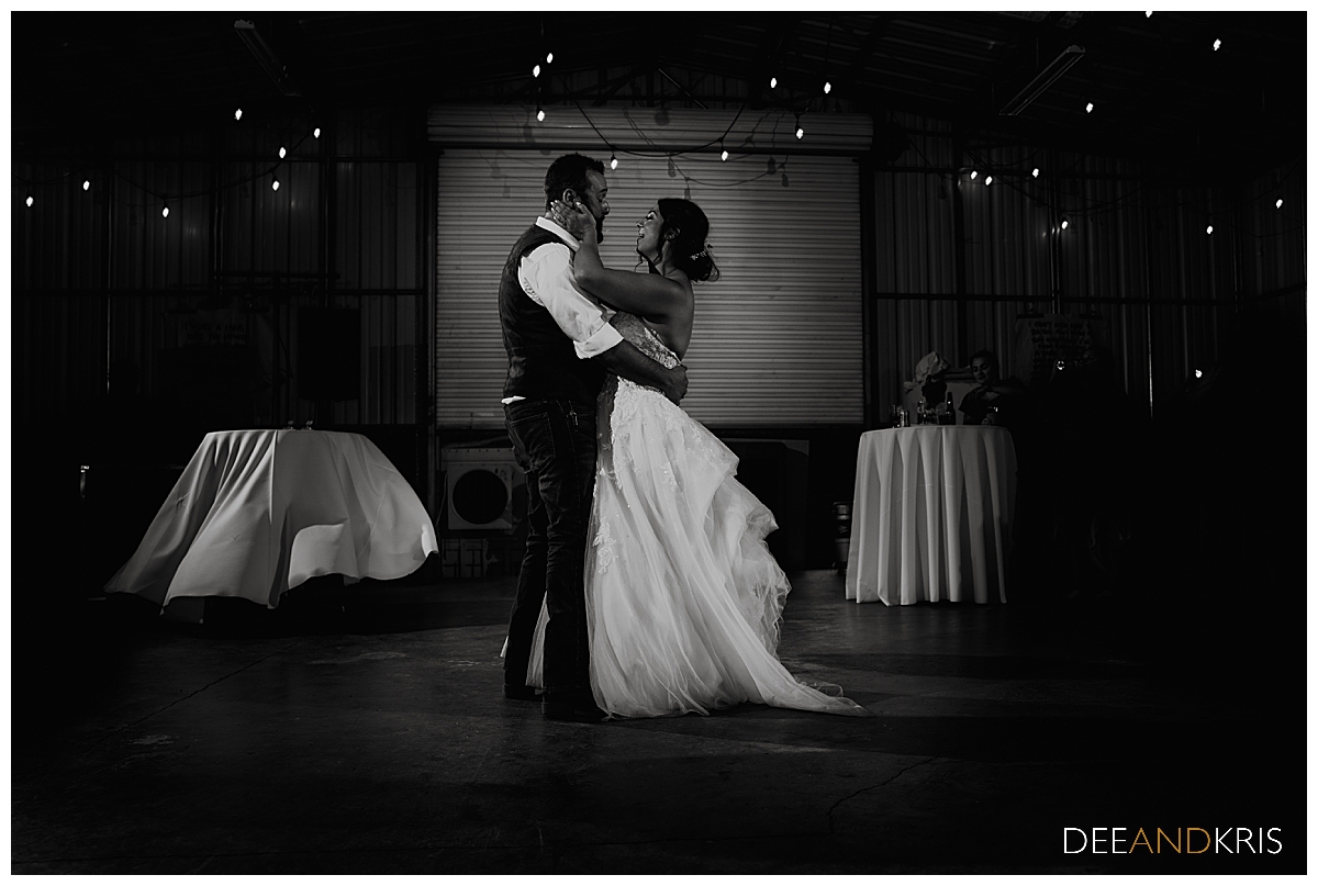 One black and white image of couple sharing their first dance.